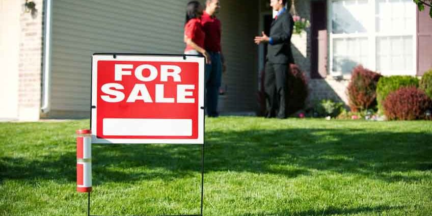 Extensive series of a Caucasian Real Estate Agent and African-American Couple in front of a home.